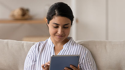 A image of an employee filling out a questionnaire on their tablet